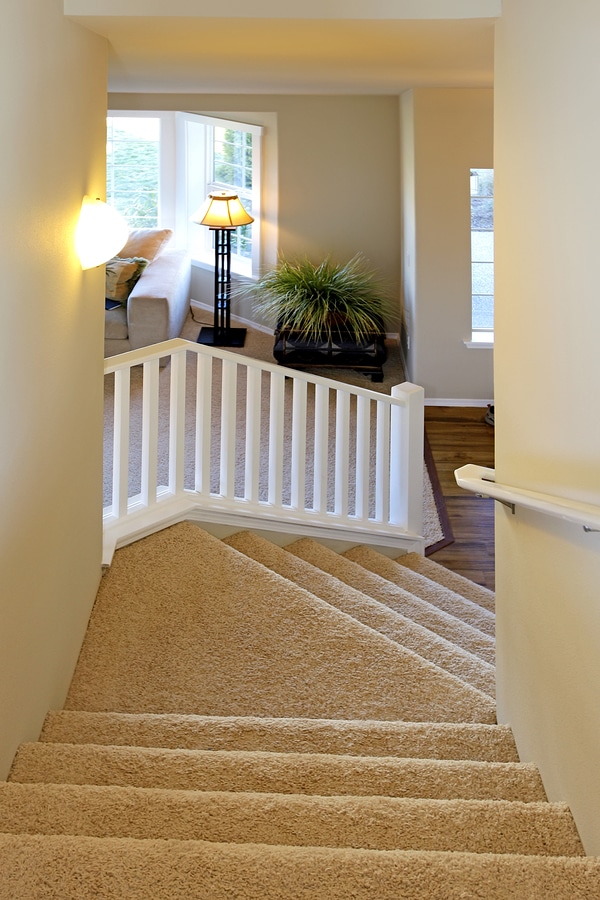 Companion care can help aging seniors safely navigate stairs in their homes.